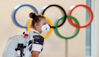Virus spreads among Tokyo Olympics parti...
